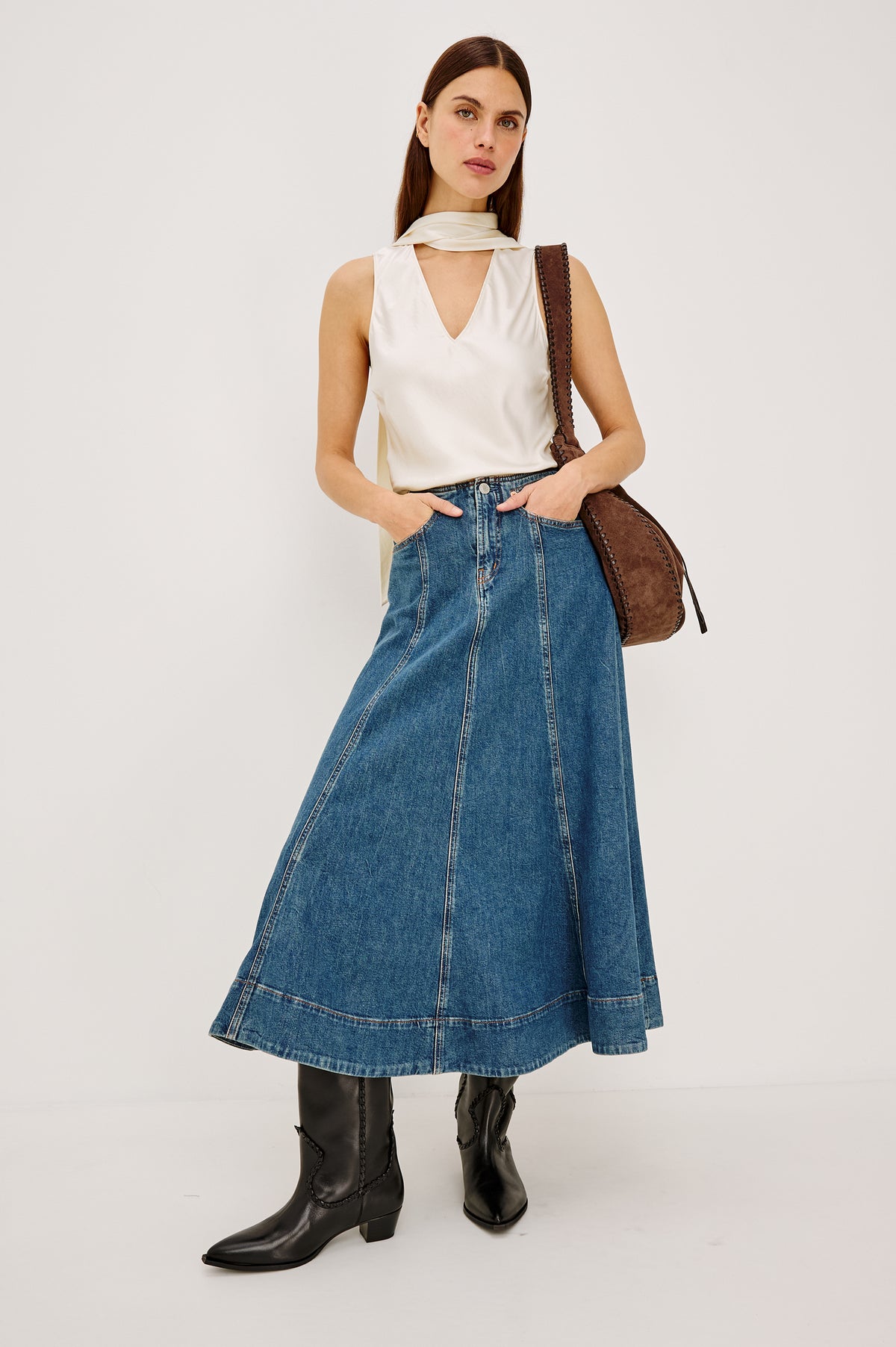 Vicente Midi Skirt in Comfort-Stretch Denim With High-Waisted Fit, Back Yoke, Side Pockets, No Waistband in Meadowbrook Colorway - Full Body Front View Featured on Model.