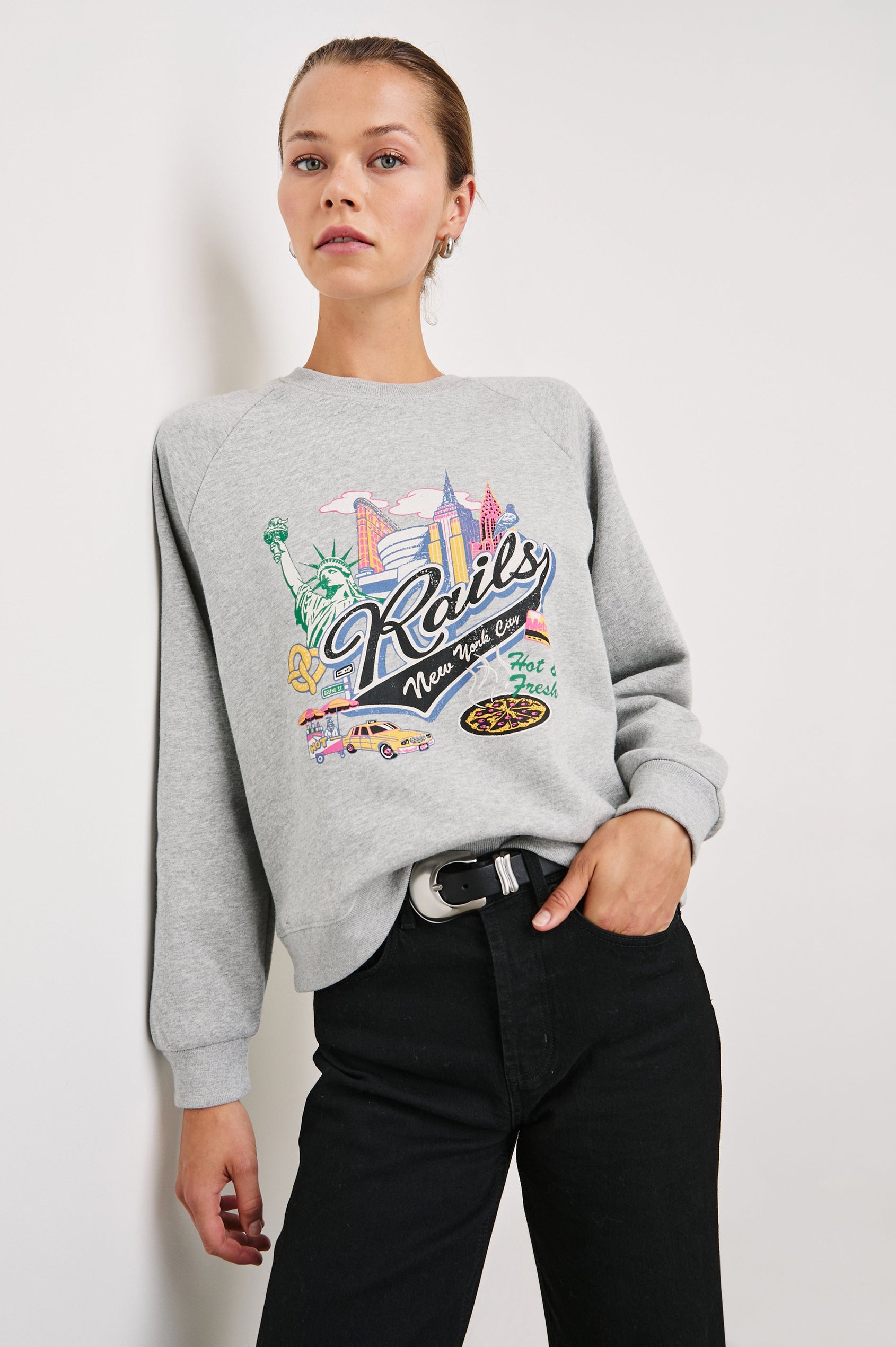 Vintage Raglan Long-Sleeve Sweatshirt with a Crew Neck, an image of landmarks in Los Angeles and the Text, Rails New York City, Hot and Fresh in Rails New York Colorway, Multi Colored on Grey - Front View Featured on Model