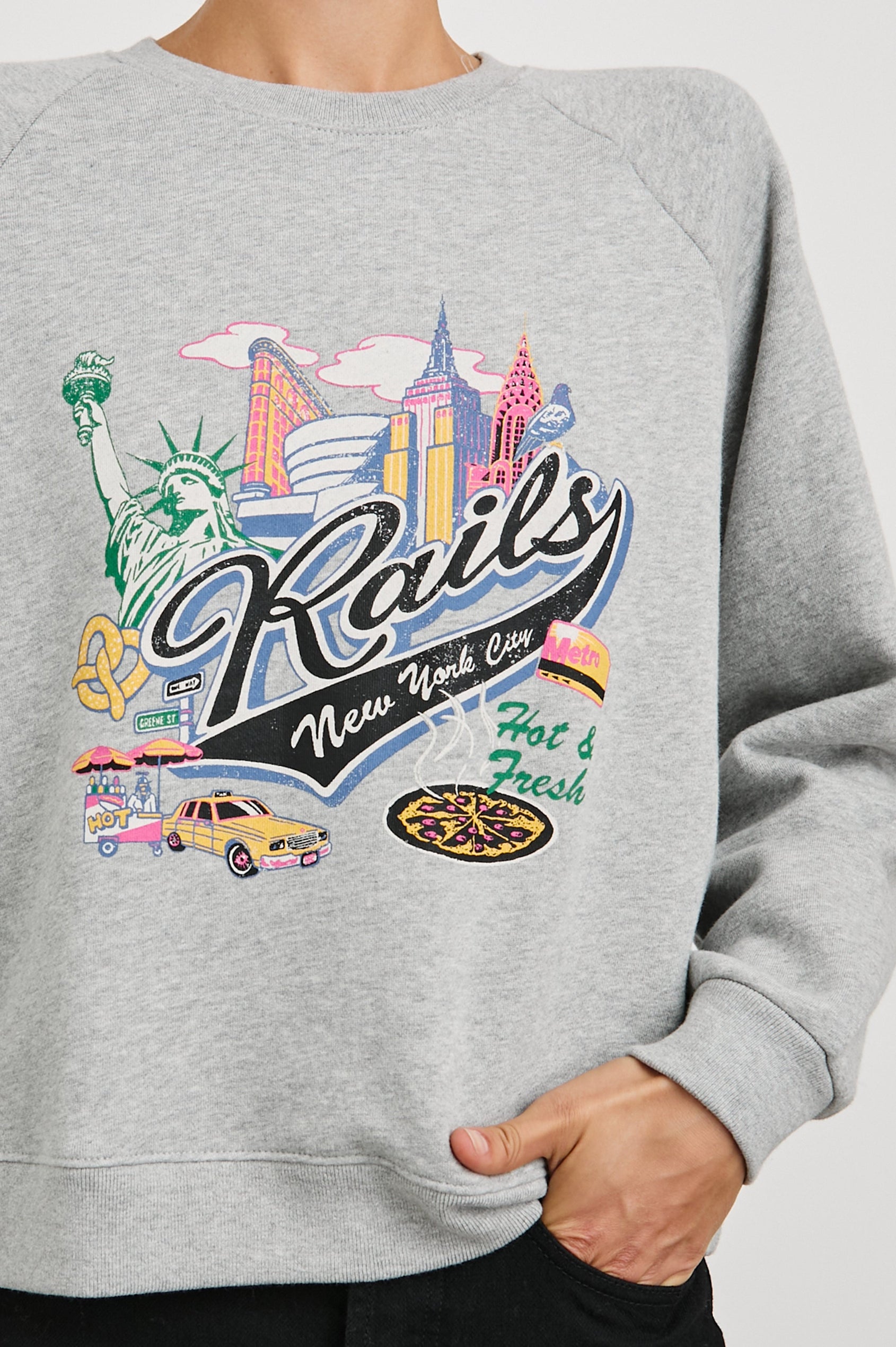 Vintage Raglan Long-Sleeve Sweatshirt with a Crew Neck, an image of landmarks in Los Angeles and the Text, Rails New York City, Hot and Fresh in Rails New York Colorway, Multi Colored on Grey - Front View Featured on Model
