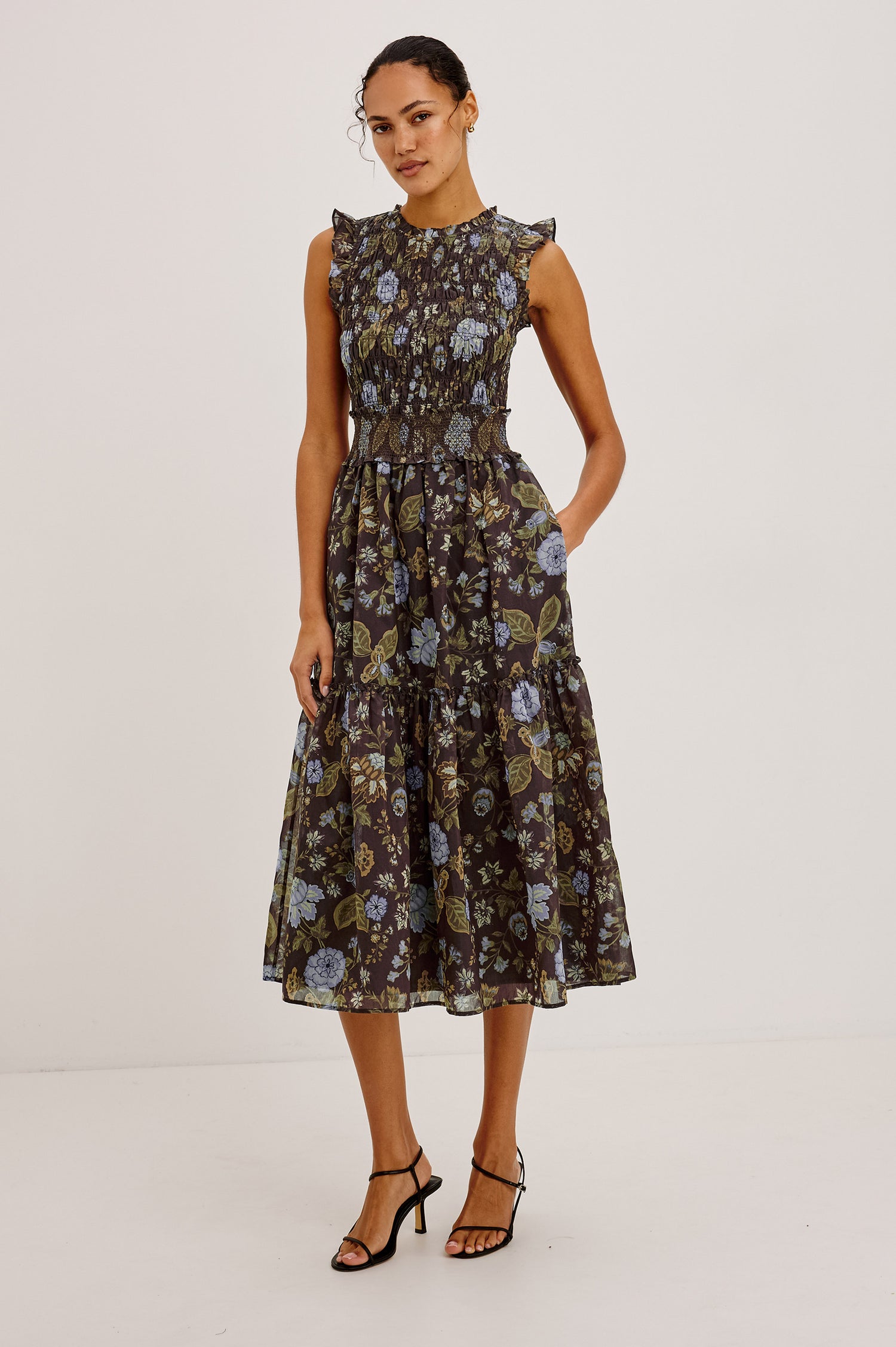 Vivier Midi Dress in Soft Voile With Shirred Fitted Bodice and Waistband, Back Keyhole Cutout With Button-Loop Closure, Lined Single-Tiered Skirt, and Ruffle Trim in Willow Colorway - Full Body Front View Featured on Model