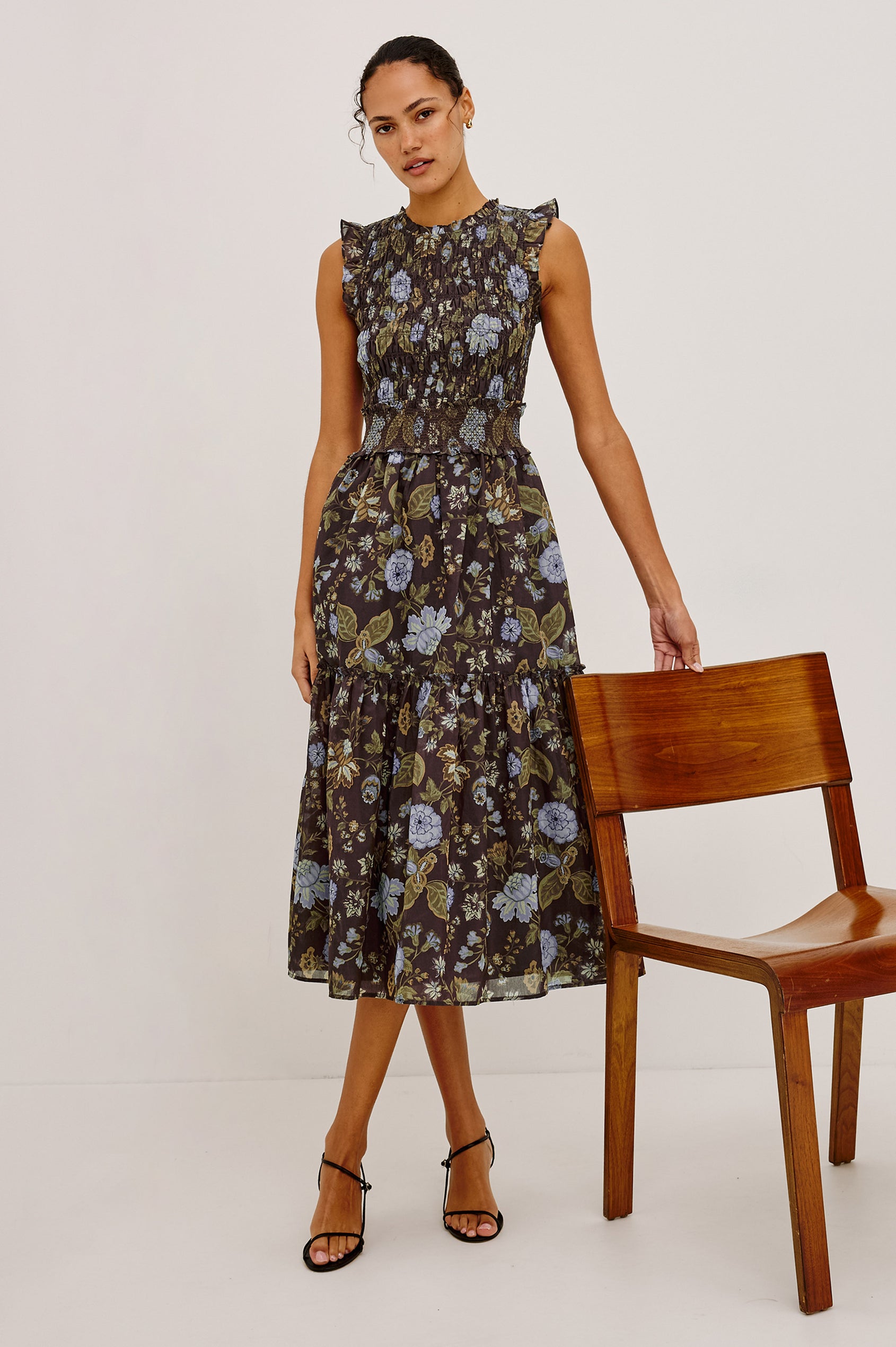 Vivier Midi Dress in Soft Voile With Shirred Fitted Bodice and Waistband, Back Keyhole Cutout With Button-Loop Closure, Lined Single-Tiered Skirt, and Ruffle Trim in Willow Colorway - Full Body Front View Featured on Model
