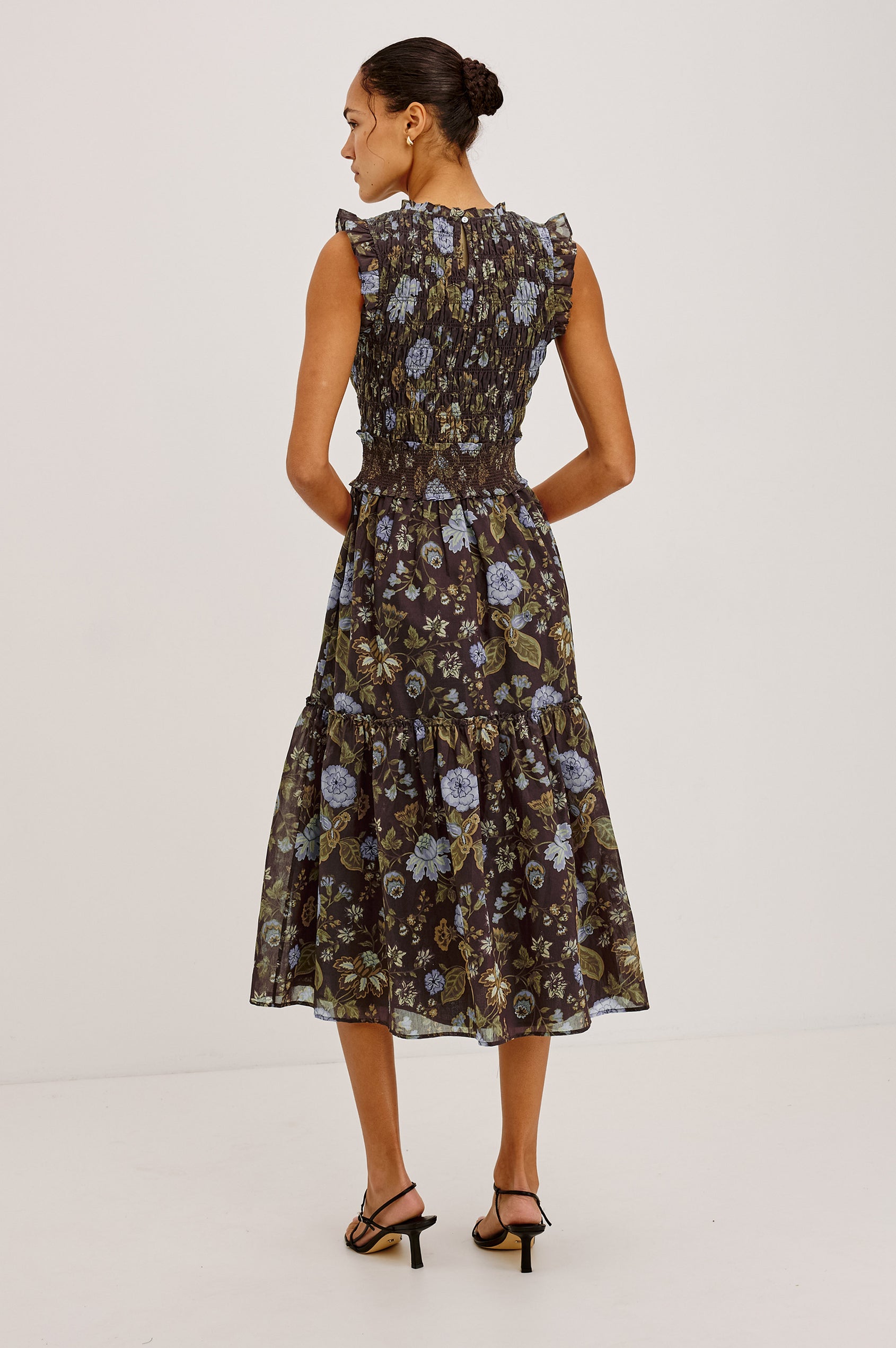 Vivier Midi Dress in Soft Voile With Shirred Fitted Bodice and Waistband, Back Keyhole Cutout With Button-Loop Closure, Lined Single-Tiered Skirt, and Ruffle Trim in Willow Colorway - Full Body Back View Featured on Model