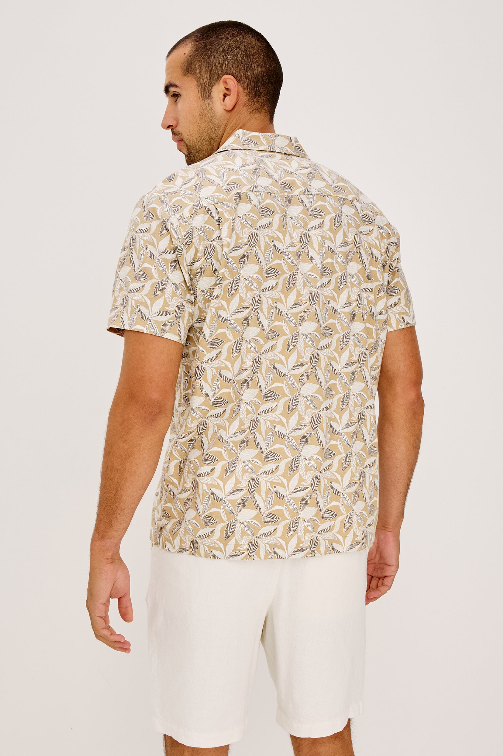 Waimea Short-Sleeve Button Up with a Chest Patch Pocket in Banana Leaf Khaki Colorway,  Back View Featured on Model