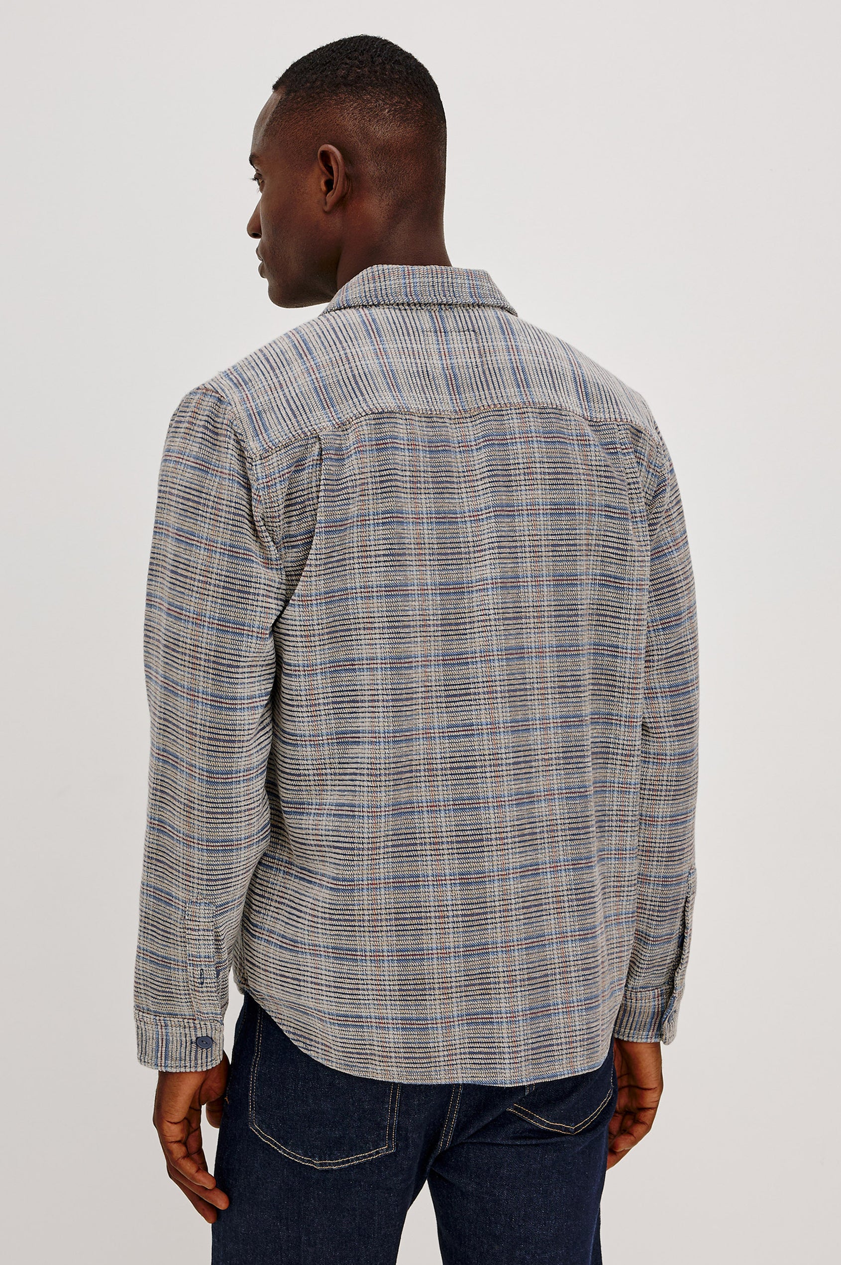 Warren Overshirt in Soft Textured Chenille Cotton With Relaxed Fit, Point Collar, Button Front, Dual Chest Flap Pockets, and Shirttail Hem in Oat Meridian Chenille Colorway - Upper Body Back View Featured on Model