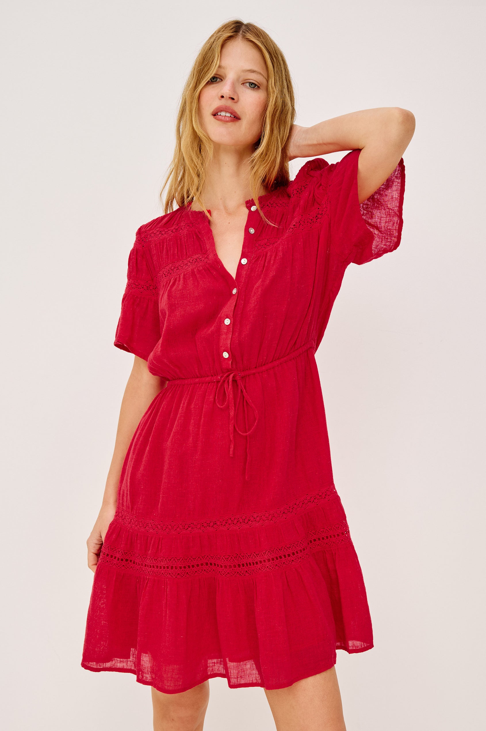 Winslow Mini Dress in Luxe Linen With Loose Fit, Lace Insets, Partial Button Front, Adjustable Drawstring Waist Ties, and a Fully Lined Skirt in Tomato Colorway - Upper Body Front View Featured on Model