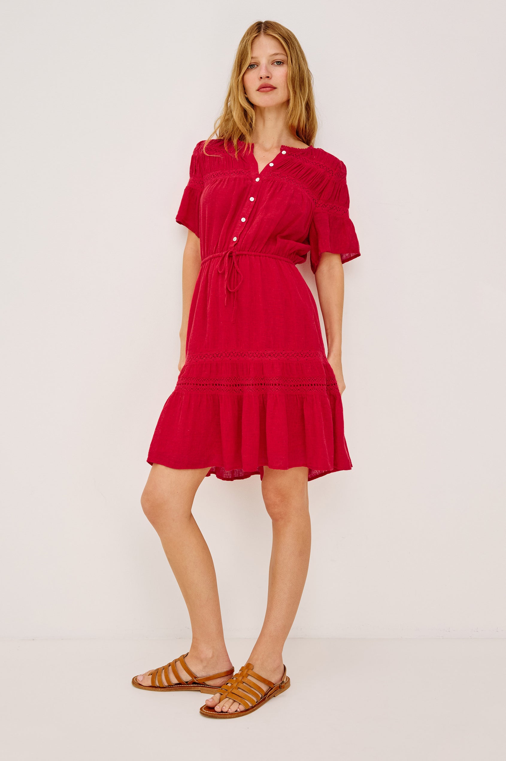 Winslow Mini Dress in Luxe Linen With Loose Fit, Lace Insets, Partial Button Front, Adjustable Drawstring Waist Ties, and a Fully Lined Skirt in Tomato Colorway - Full Body Front View Featured on Model