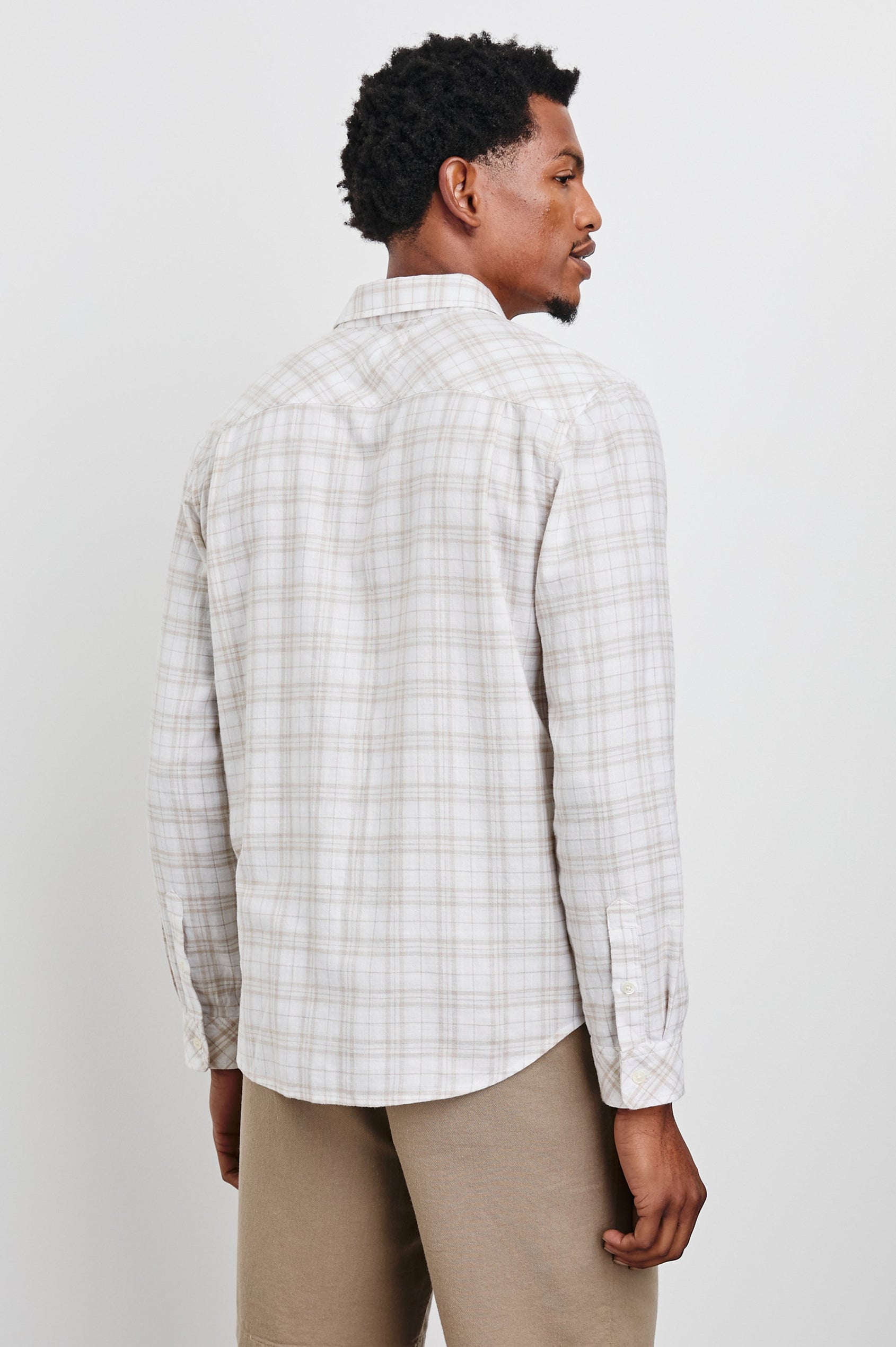Wyatt Long-Sleeve Button Up with a Chest Patch Pocket in Misty Pebble Path Colorway, a tan and grey plaid on white - Back View Featured on Model