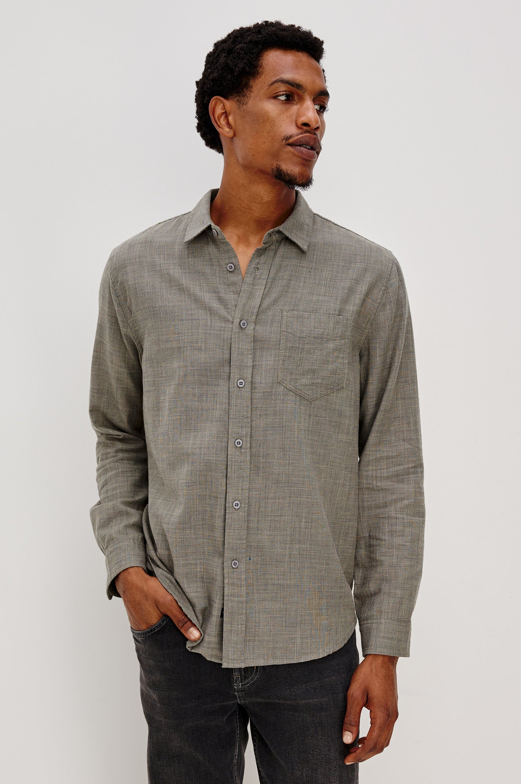 Wyatt Classic Button Up Long Sleeve Shirt with collar and front chest pocket in Spruce Etch, a light green color - front view on model