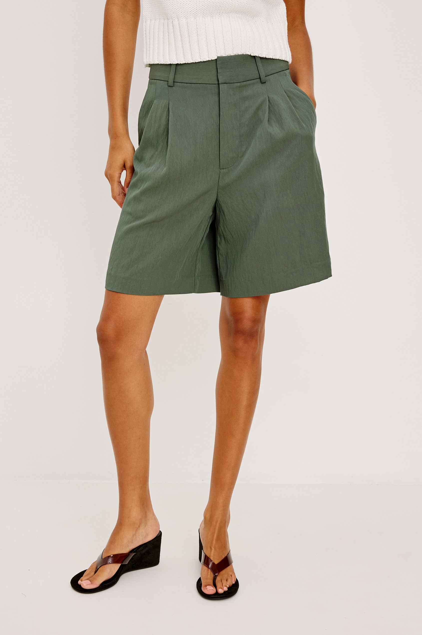 Zamora High-Waist Mid-Length Short With Front Zip Fly, Belt Loops, and Front Pleats in Ivy Colorway - Lower Body Front View Featured on Model