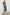 Zariah Midi Dress with Mid-Length Sleeves with Light Ruching, a Deep V Neck and an Empire Waist in Navy Flora Colorway, flowers in orange and blues on Navy - Front Full Body View Featured on Model