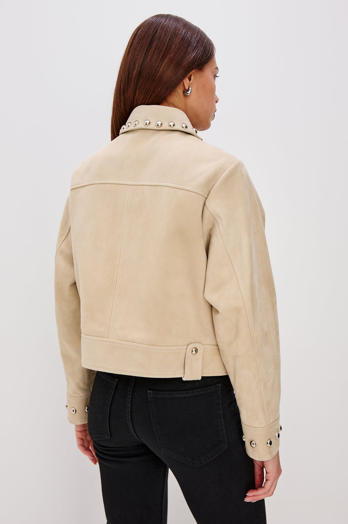 Zeta Boxy Moto Jacket in Suede With Metallic Studs, Collar, Front Zip Closure, Chest Flap Pockets, and Long Sleeves in Taupe Colorway - Full Body Front View Featured on Model