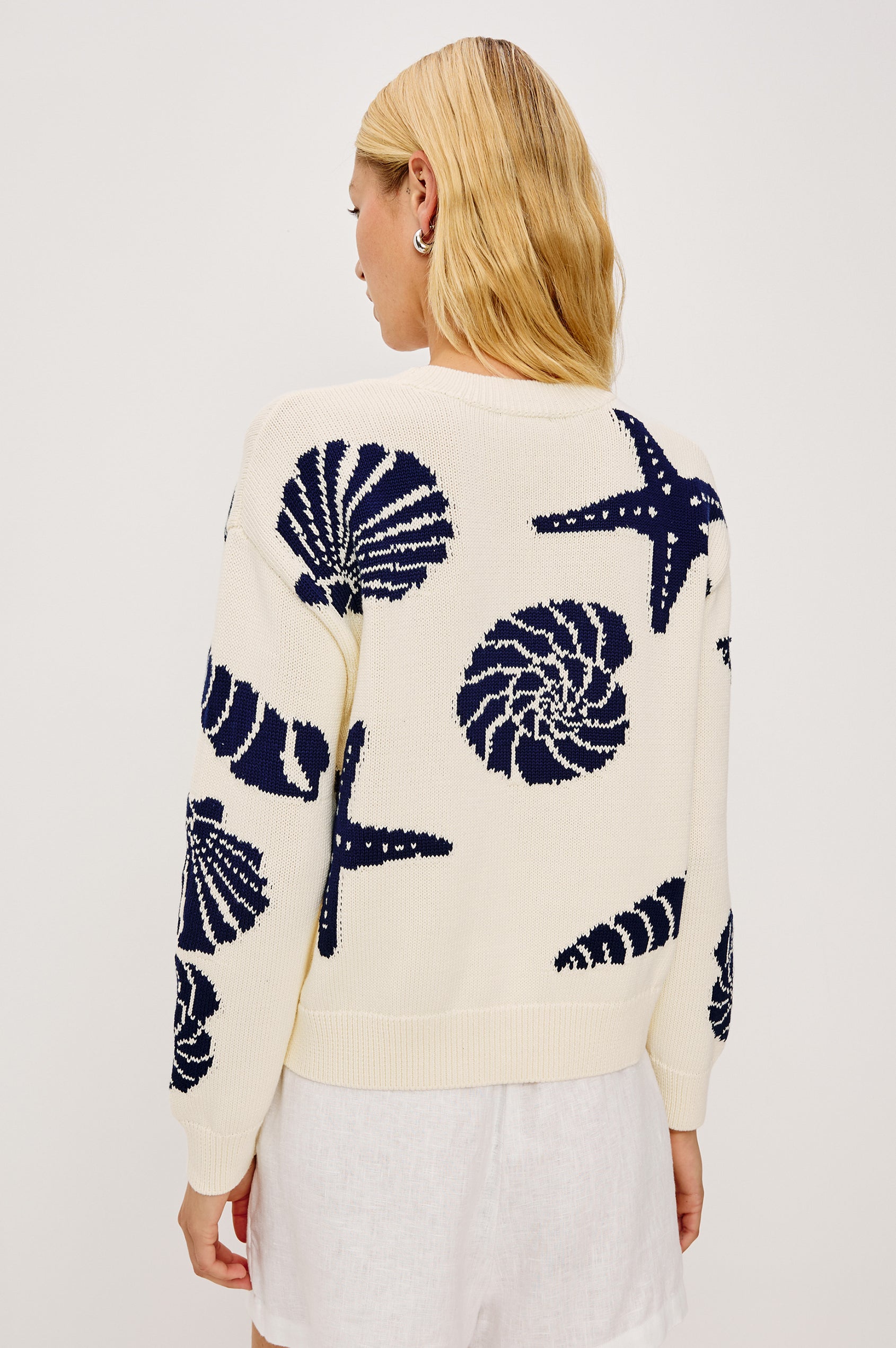 Zoey Crewneck Sweater in Cotton Blend Knit With Seashell Embroidery, Long Sleeves, Relaxed Fit, and Ribbed Trim - Upper Body Back View Featured on Model