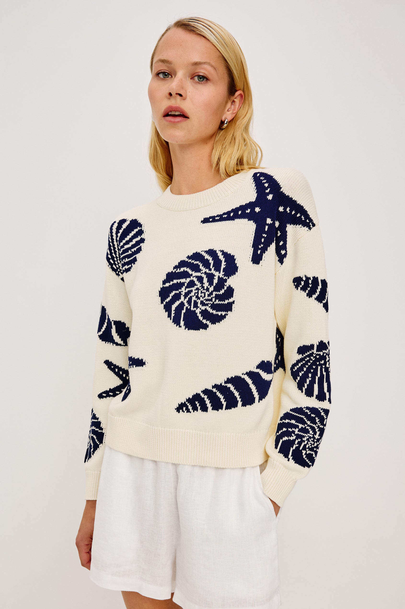 Zoey Crewneck Sweater in Cotton Blend Knit With Seashell Embroidery Long Sleeves Relaxed Fit and Ribbed Trim - Upper Body Front View Featured on Model