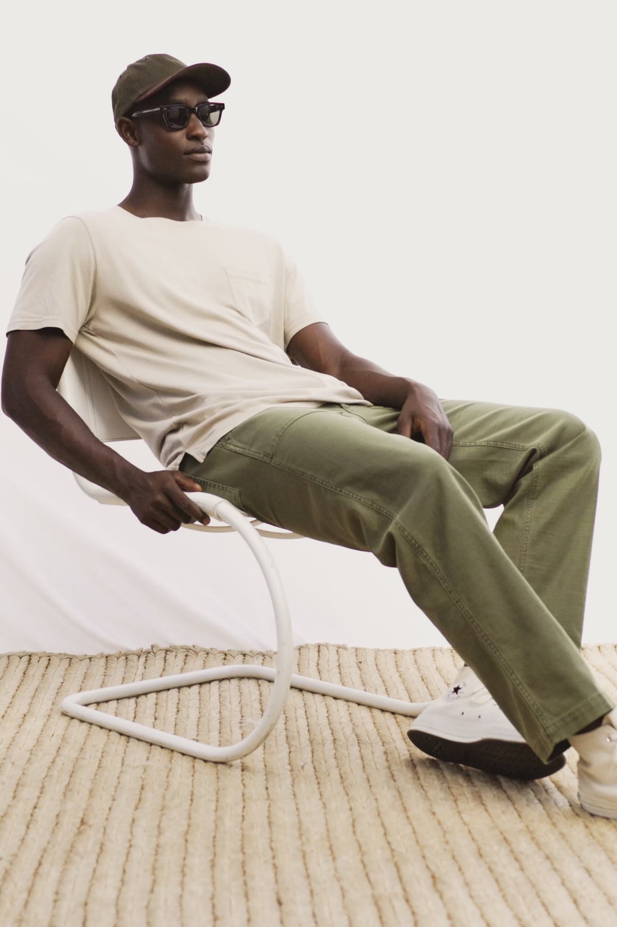 Decker Relaxed Straight Leg Workwear Pant in Stretch Cotton With Lived-In Wash, Zip Fly, and Side and Back Buttoned-Flap Pockets in Olive Colorway - Video - Full Body Front View Featured on Model