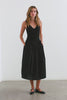 (Video): Franca Dress in Black shown on a model to showcase the ultra-soft jersey cotton bodice, lightweight poplin skirt, twisted jersey straps, and dropped waist. Full Body View Featured on Model.