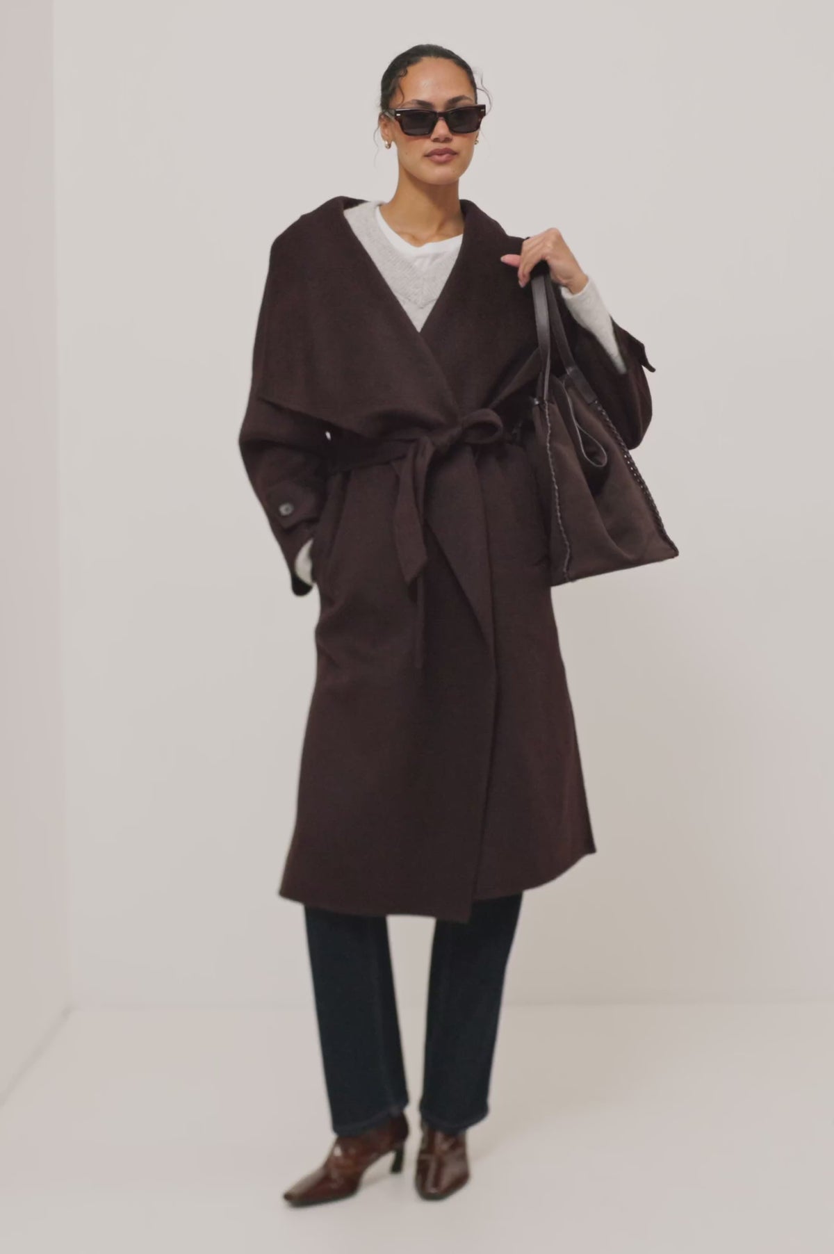 Celeste Coat in Heavy Wool Blend With Shawl Collar, Full Length, Self-Belted Waist, Side Pockets, Button-Tab Cuffs, and Half-Lined Interior in Chocolate Colorway - Video - Full Body Front View Featured on Model