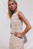Kane Sleeveless Fitted Top in Cotton With Diamond Smocking All Over High Boat Neckline and Flared Ruffle Hem in Rouge Romantic Colorway - Full Body Front View Featured on Model - Video